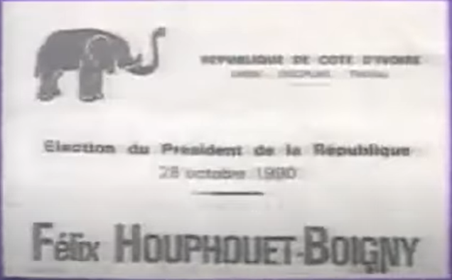 L’étudiant Hamed Bakayoko aux côtés du Président Félix Houphouët-Boigny , en 1990.