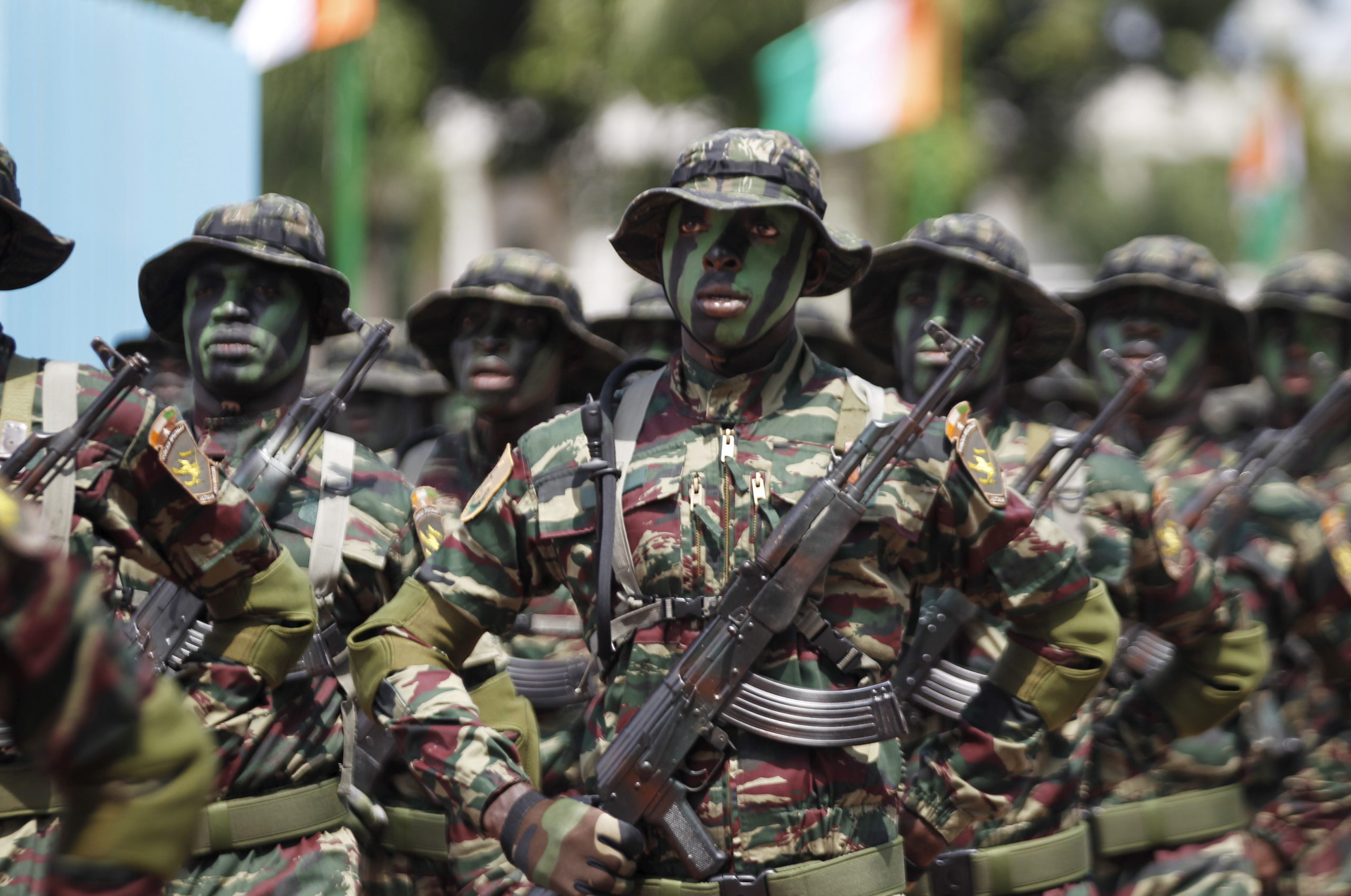 Ivory Coast's special force soldiers participate in a military parade to commemorate the country's 55th Independence Day in Abidjan